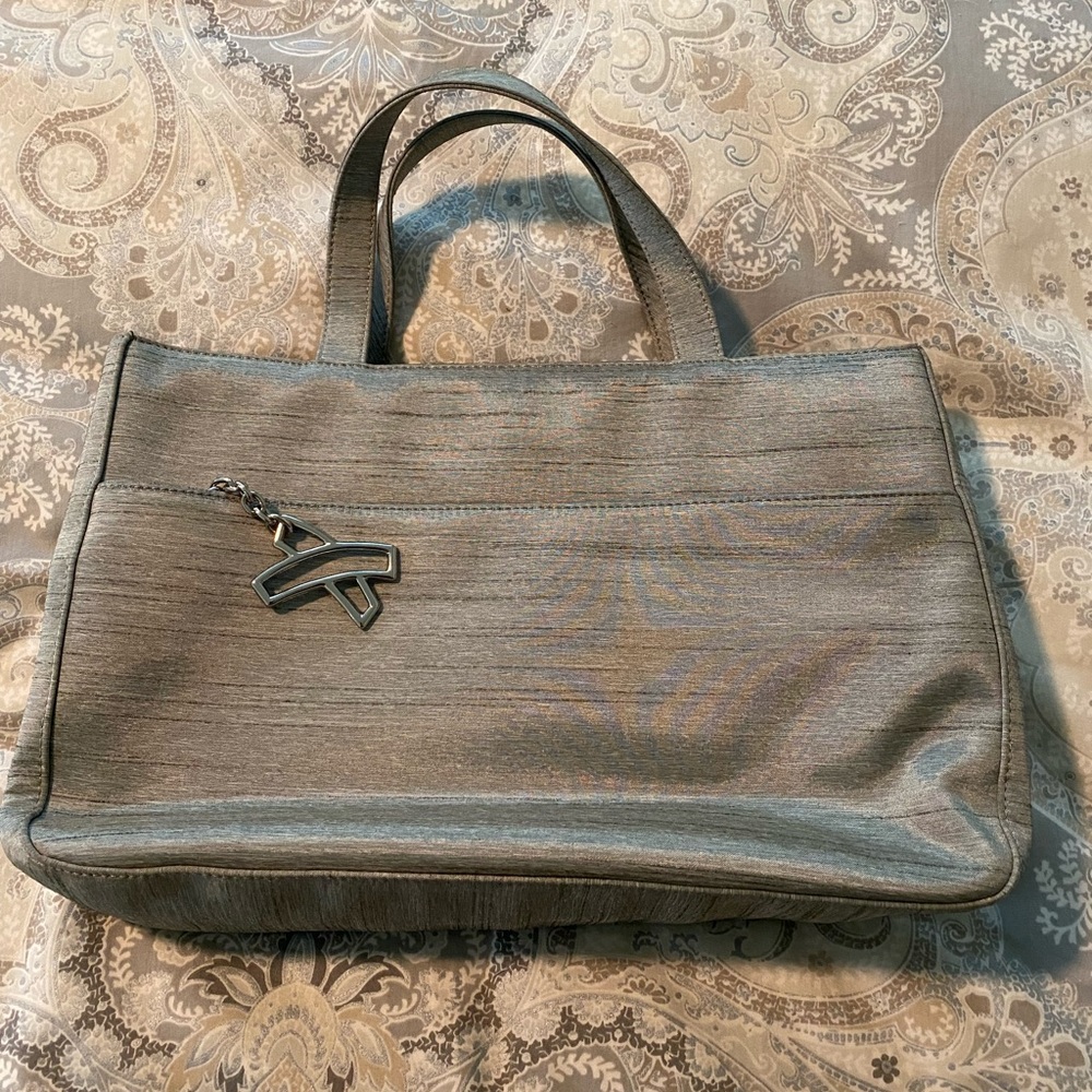 Used once Paloma Picasso light gray silk handbag